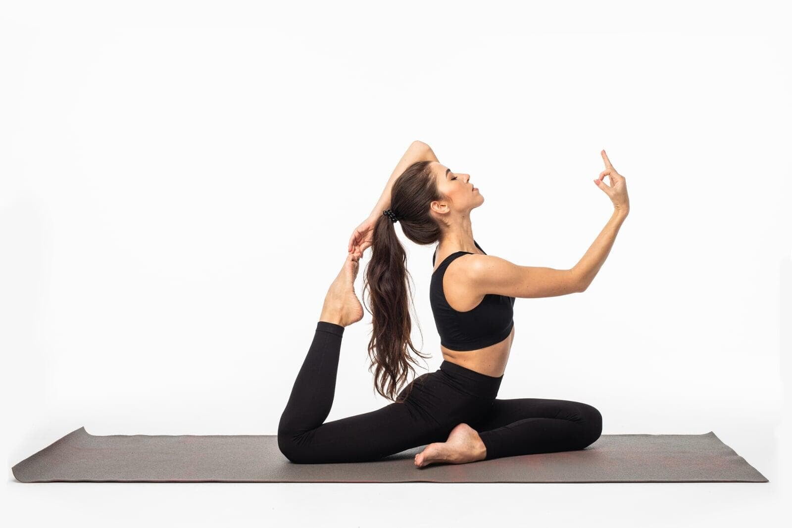 Woman practising a seated yoga pose