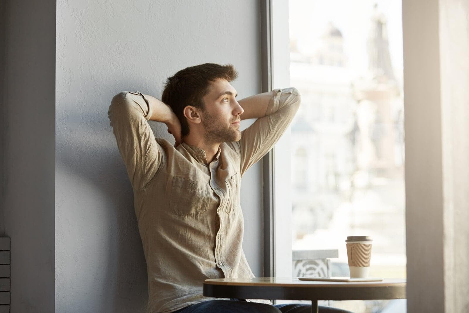 Person resting quietly by a window